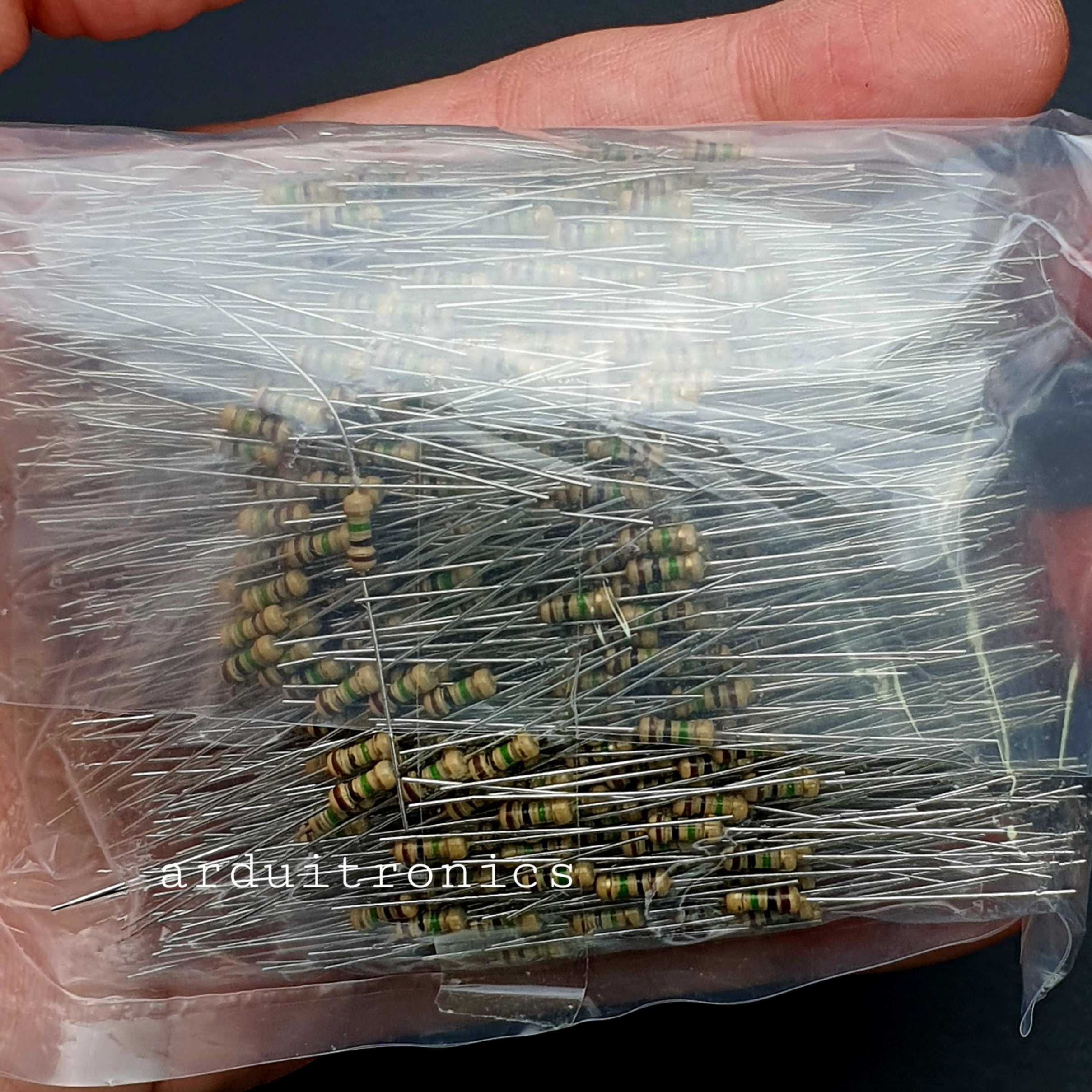 Resistor 1M Ohm (1/4 W +-5%) แพ็คละ 1000 ตัว