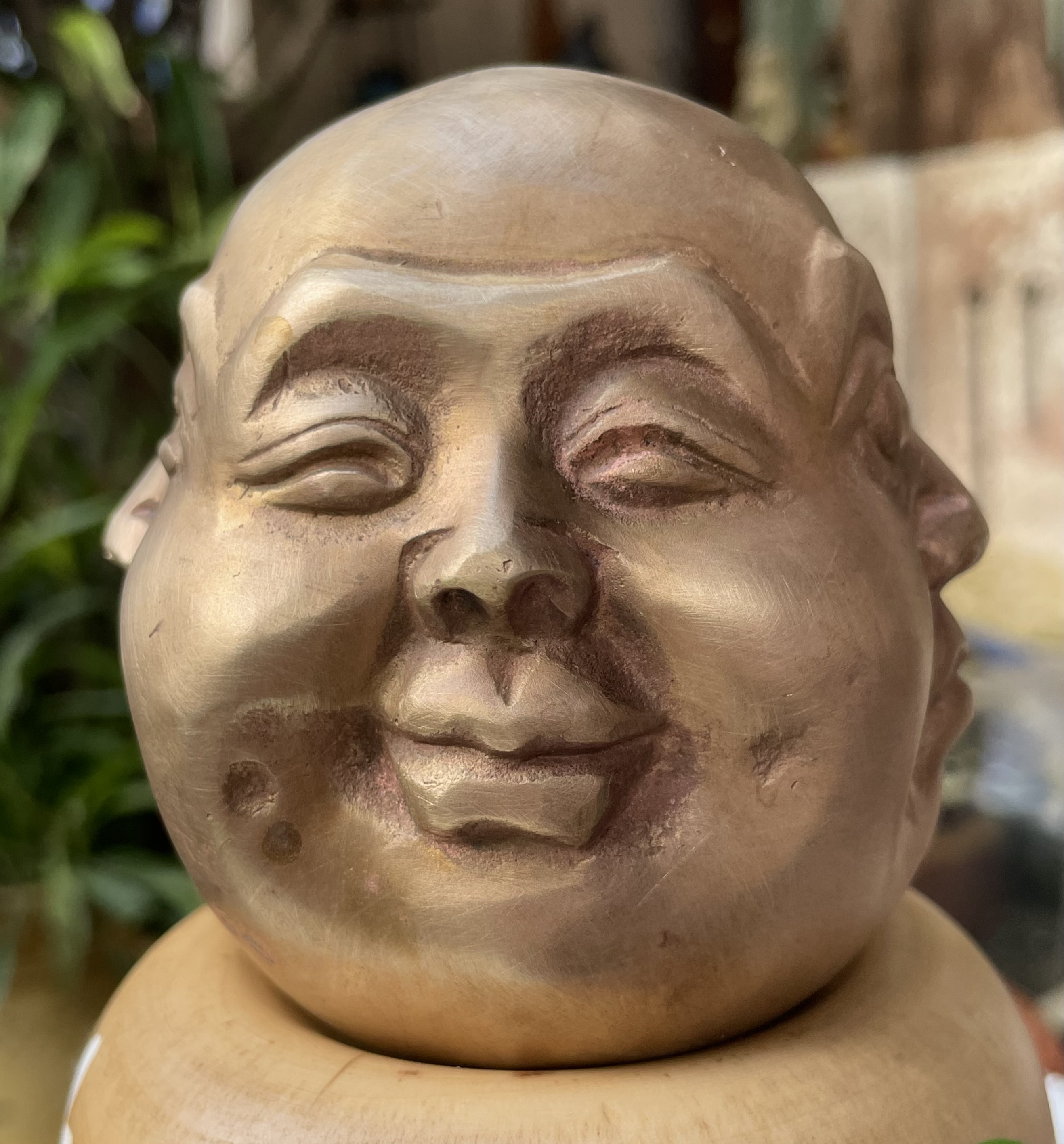 หัวพระพุทธรูปทองเหลืองสี่หน้า The Four-Faced Buddha or Four-Faced God