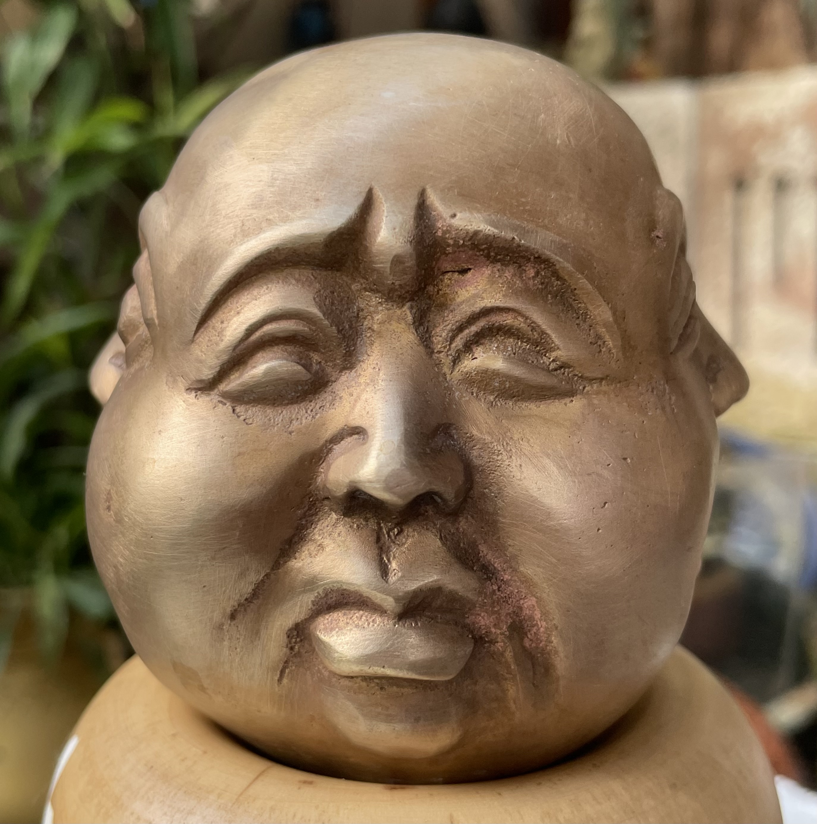 หัวพระพุทธรูปทองเหลืองสี่หน้า The Four-Faced Buddha or Four-Faced God