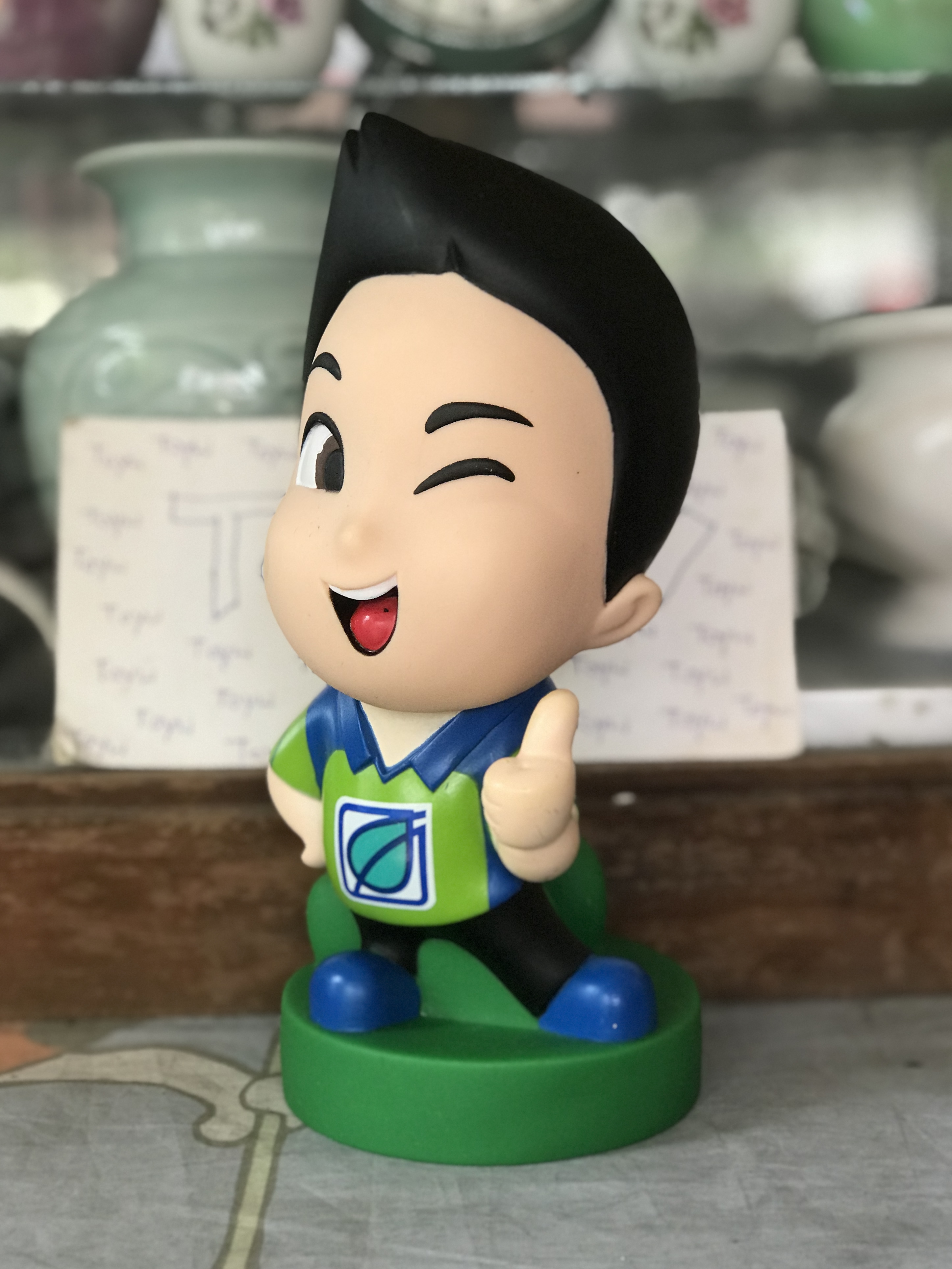 เริ่มต้น 790 บาท มือ 1 และมือ 2 โมเดลมาสคอตกระปุกออมสิน Bangchak Inthanin ร้านกาแฟอินทนิล Inthanin Cafe ปั้มน้ำมันบางจาก Bangchak ขนาด กว้าง 9 ซม สูง 20-21 ซม
