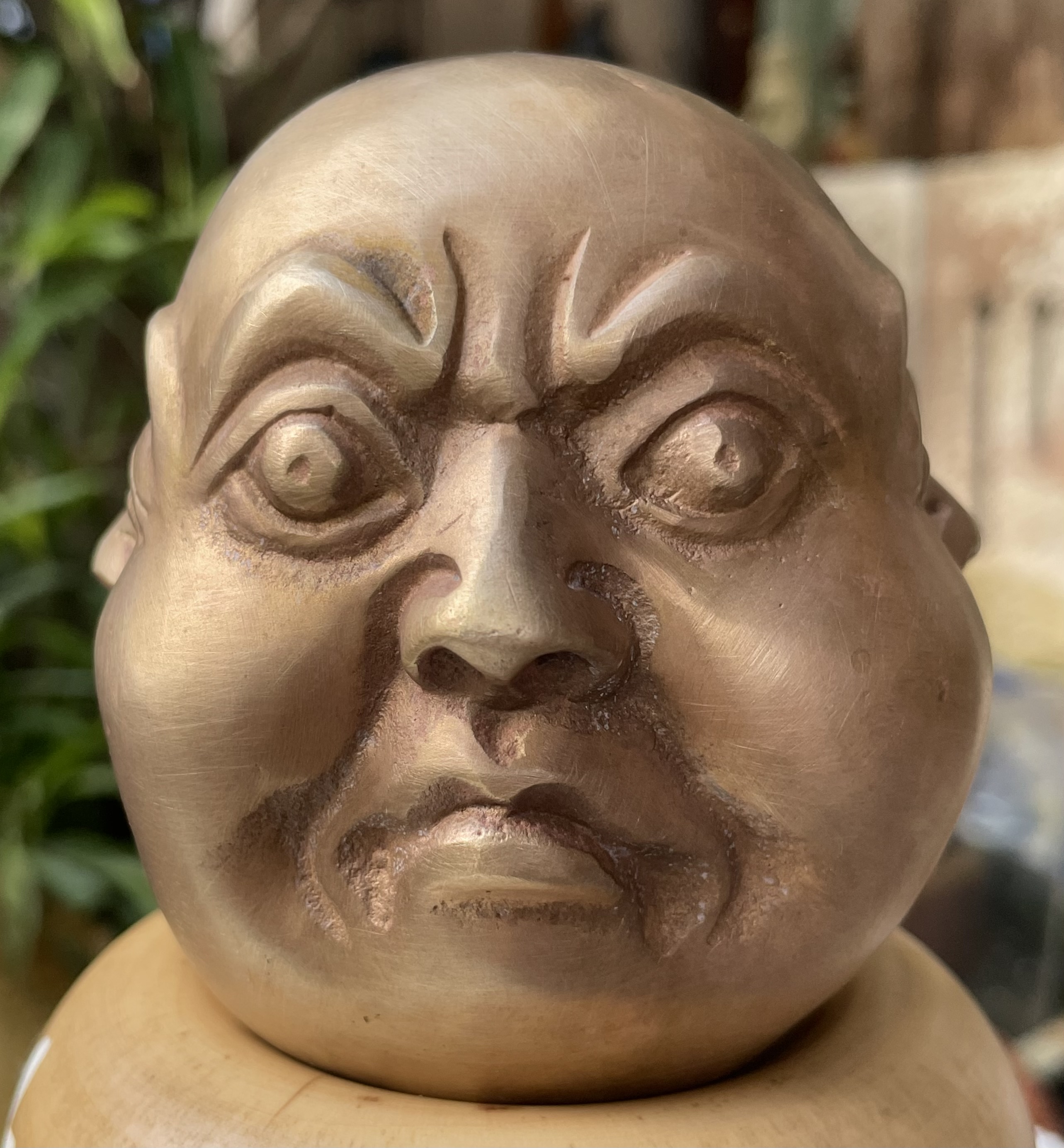 หัวพระพุทธรูปทองเหลืองสี่หน้า The Four-Faced Buddha or Four-Faced God