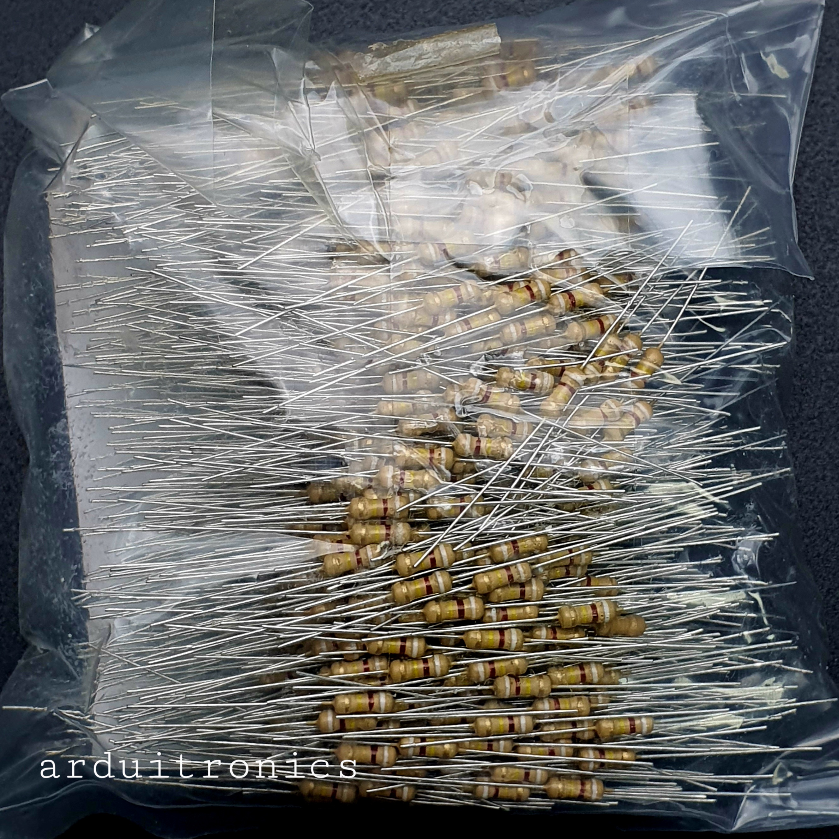 Resistor 910K Ohm (1/4 W +-5%) แพ็คละ 1000 ตัว