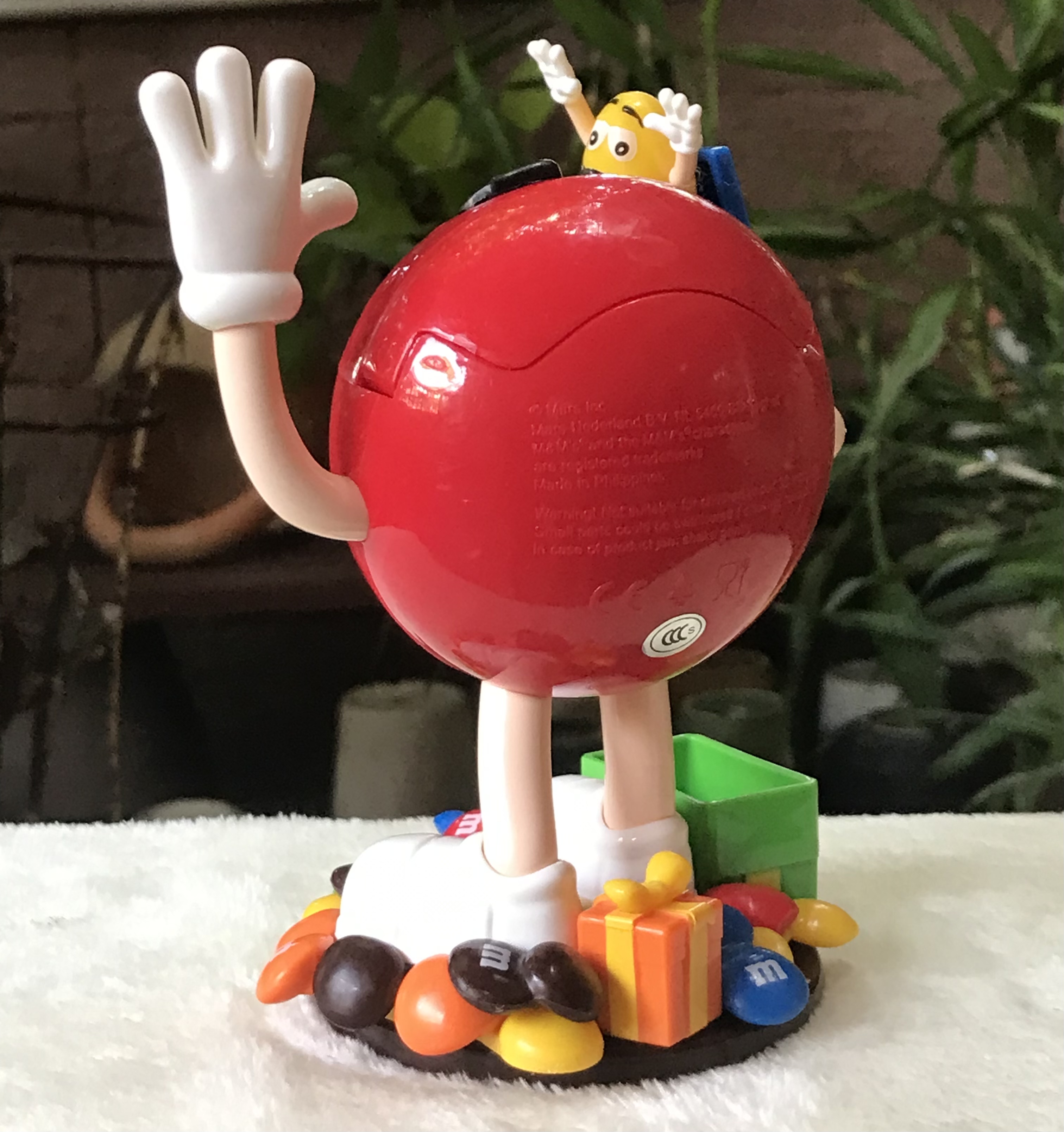 ￼โมเดล ตุ๊กตา M&M เอ็ม แอนด์ เอ็ม เปิดฝาหลังได้ แขนขยับได้ M&M Jack in the box Chocolate Candy Dispenser Toy