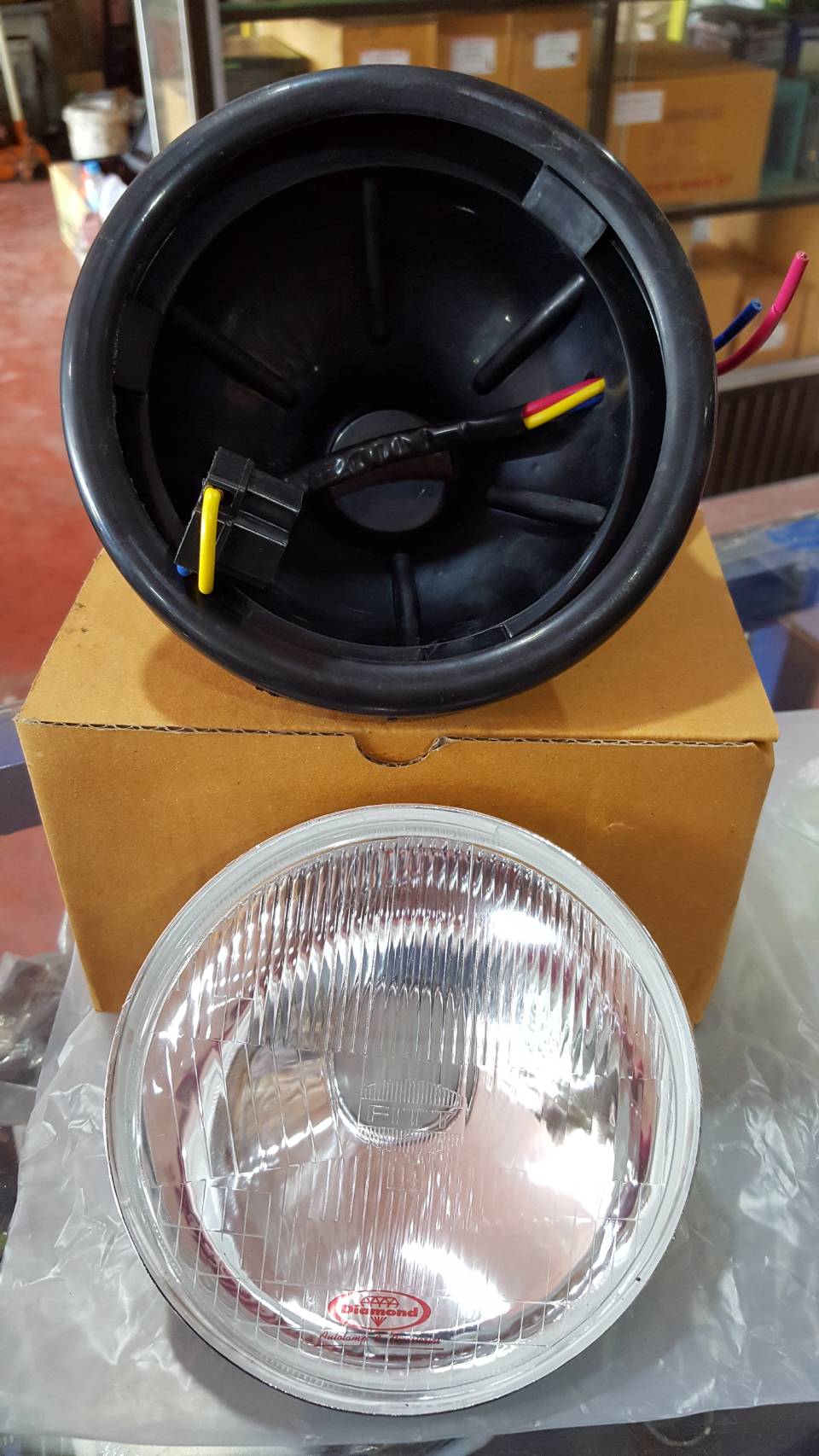 ชุดโคมยางไฟหน้ารถไถฟอร์ด พร้อมดวงไฟหน้าชนิดเปลี่ยนไส้ได้ ไส้หลอดไฟ OSRAM 60/55w