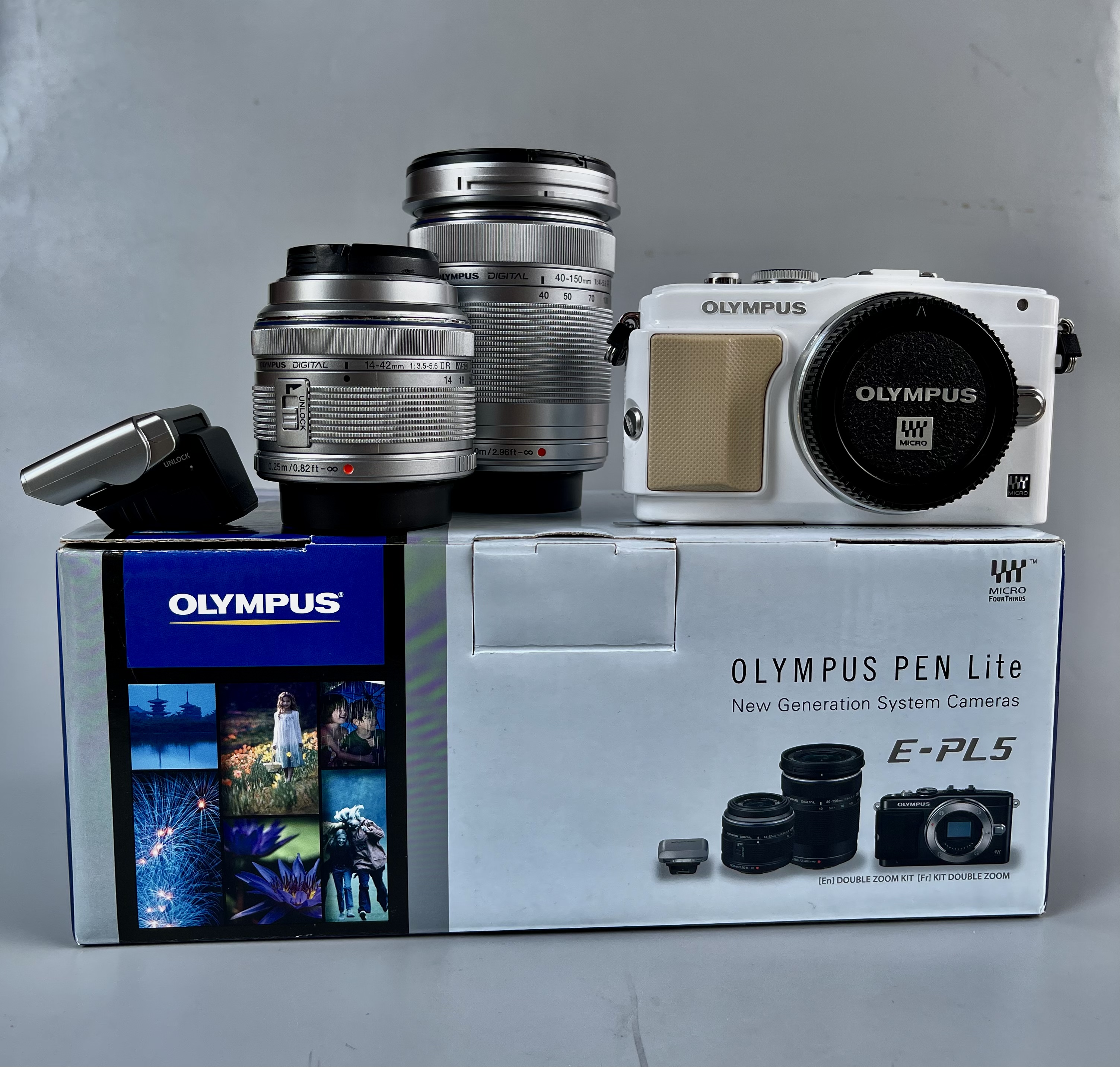 ขายกล้อง Olympus EPL5 ซื้อศูนย์ไทย สภาพเหมือนใหม่ แฟลชแท้ เลนส์คิด olympus 14-42mm , olympus 40-150mm แถมเลนส์olympus15mm f8 cap lens , ถ่นแท้ 2 ก้อน ราคาsetนี้สุดคุ้ม