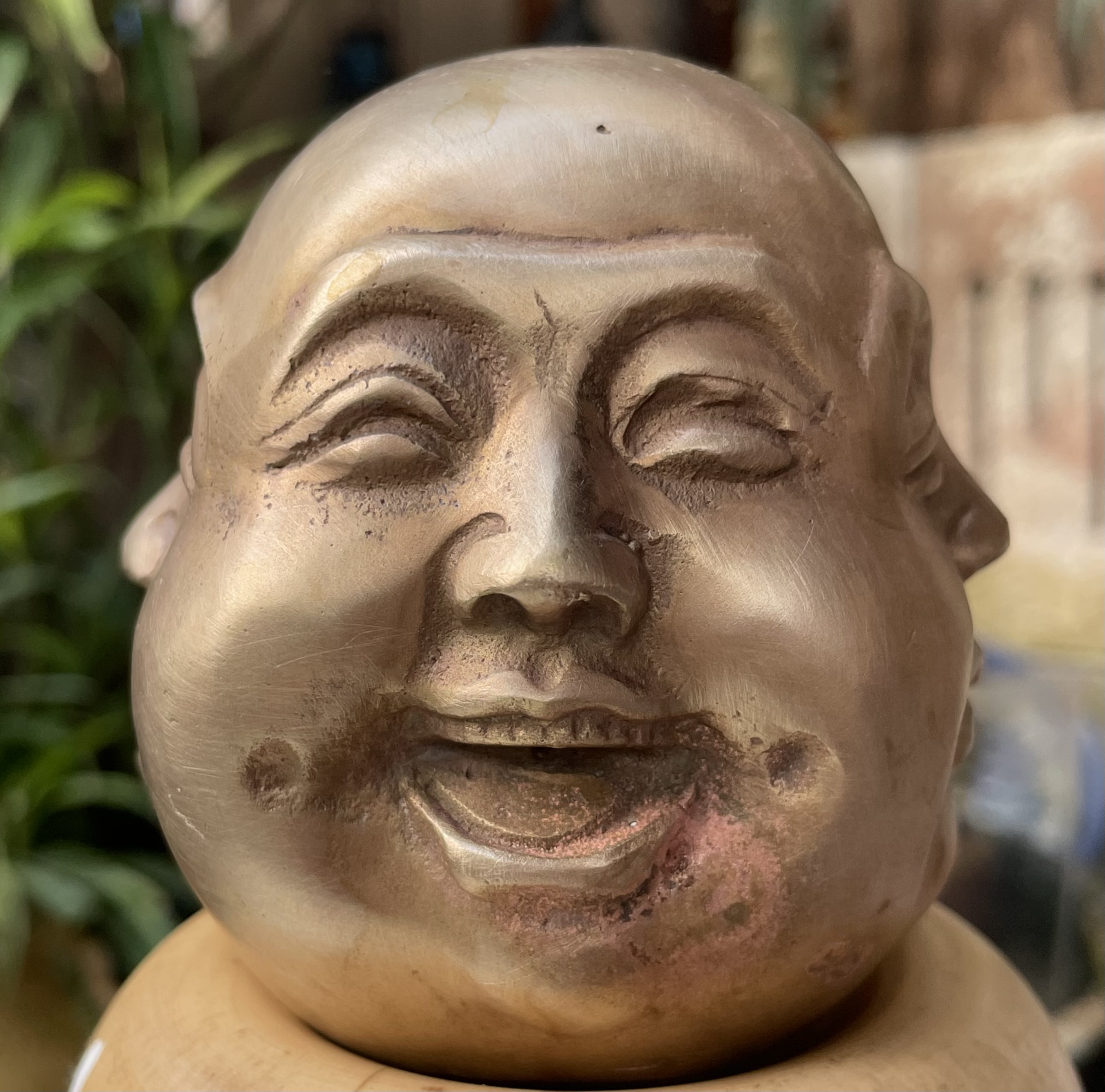 หัวพระพุทธรูปทองเหลืองสี่หน้า The Four-Faced Buddha or Four-Faced God