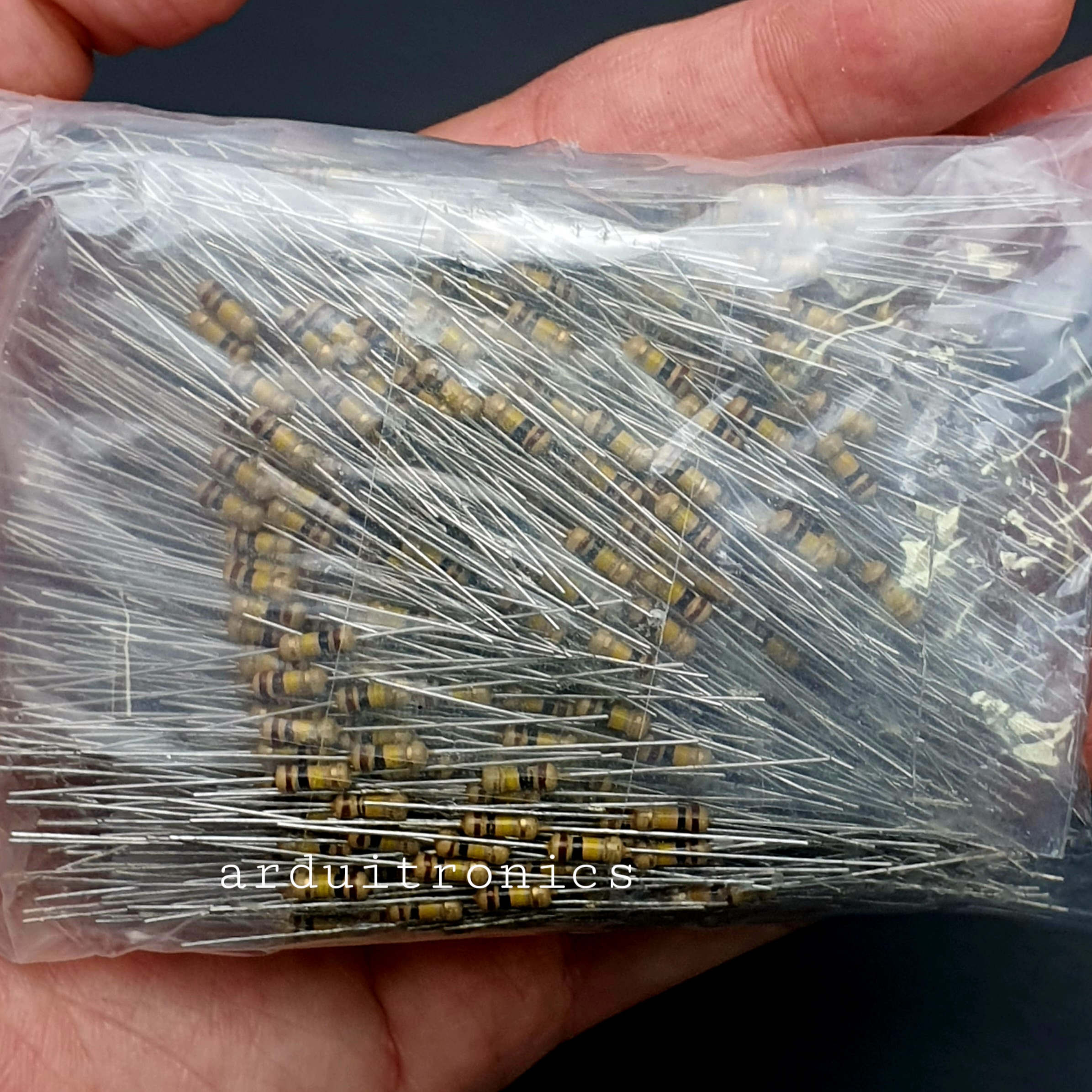 Resistor 100K Ohmn (1/4 W +-5%) แพ็คละ 1000 ตัว