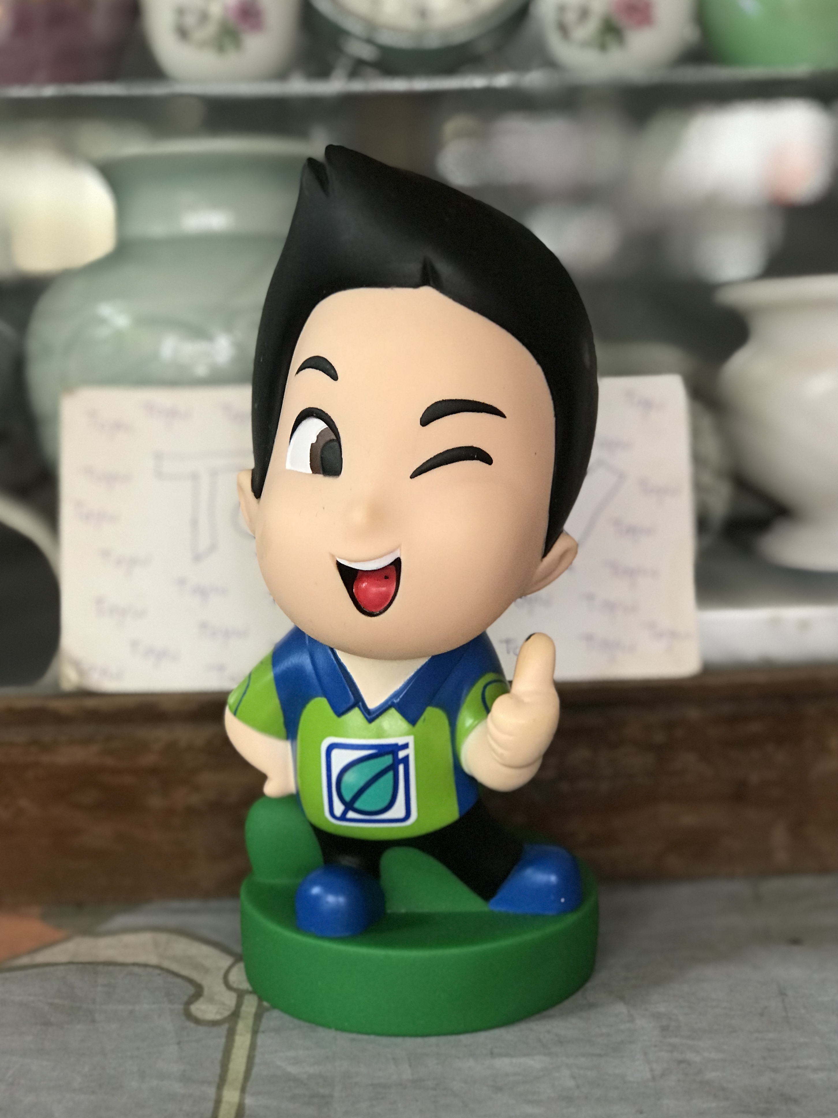 เริ่มต้น 790 บาท มือ 1 และมือ 2 โมเดลมาสคอตกระปุกออมสิน Bangchak Inthanin ร้านกาแฟอินทนิล Inthanin Cafe ปั้มน้ำมันบางจาก Bangchak ขนาด กว้าง 9 ซม สูง 20-21 ซม